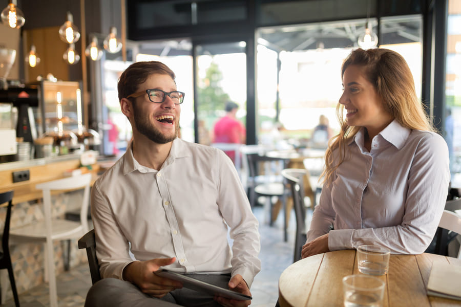 cafe with happy people surfaces treated with nanoman antibacterial 365